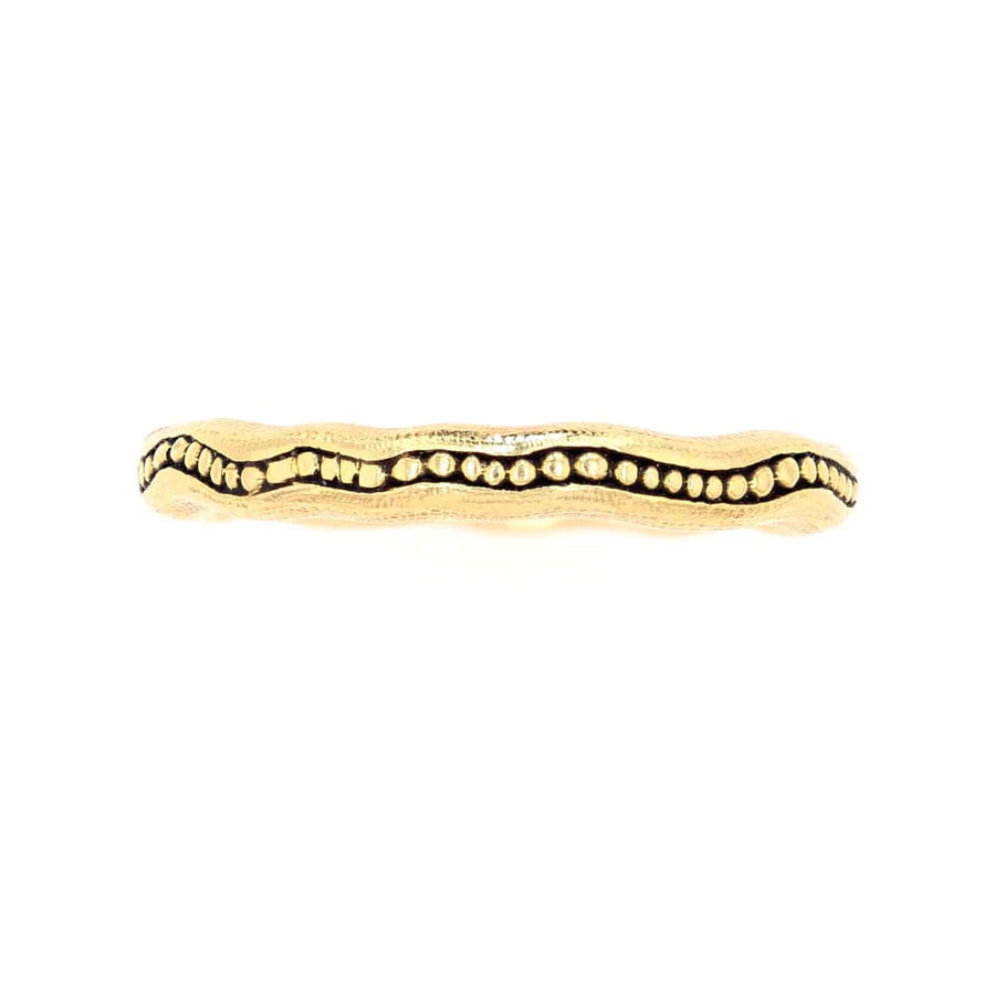 front of gold ring