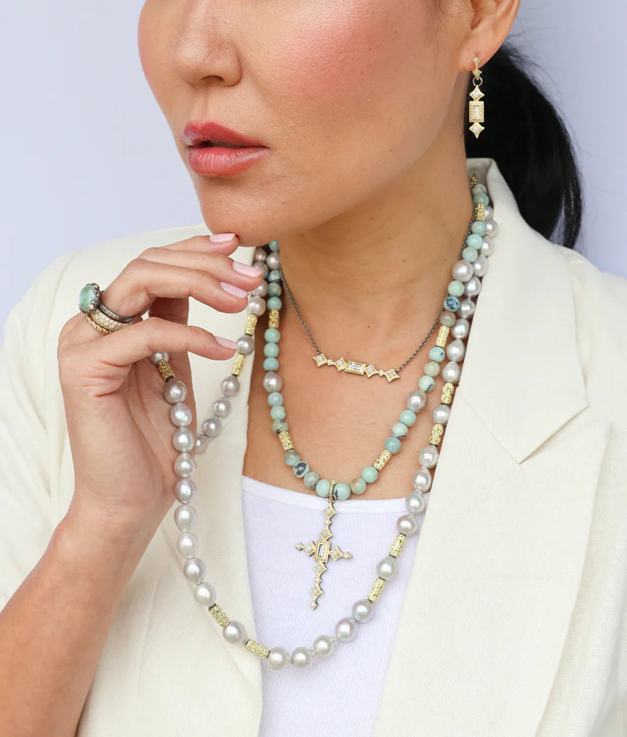 woman adorned with lots of jewelry