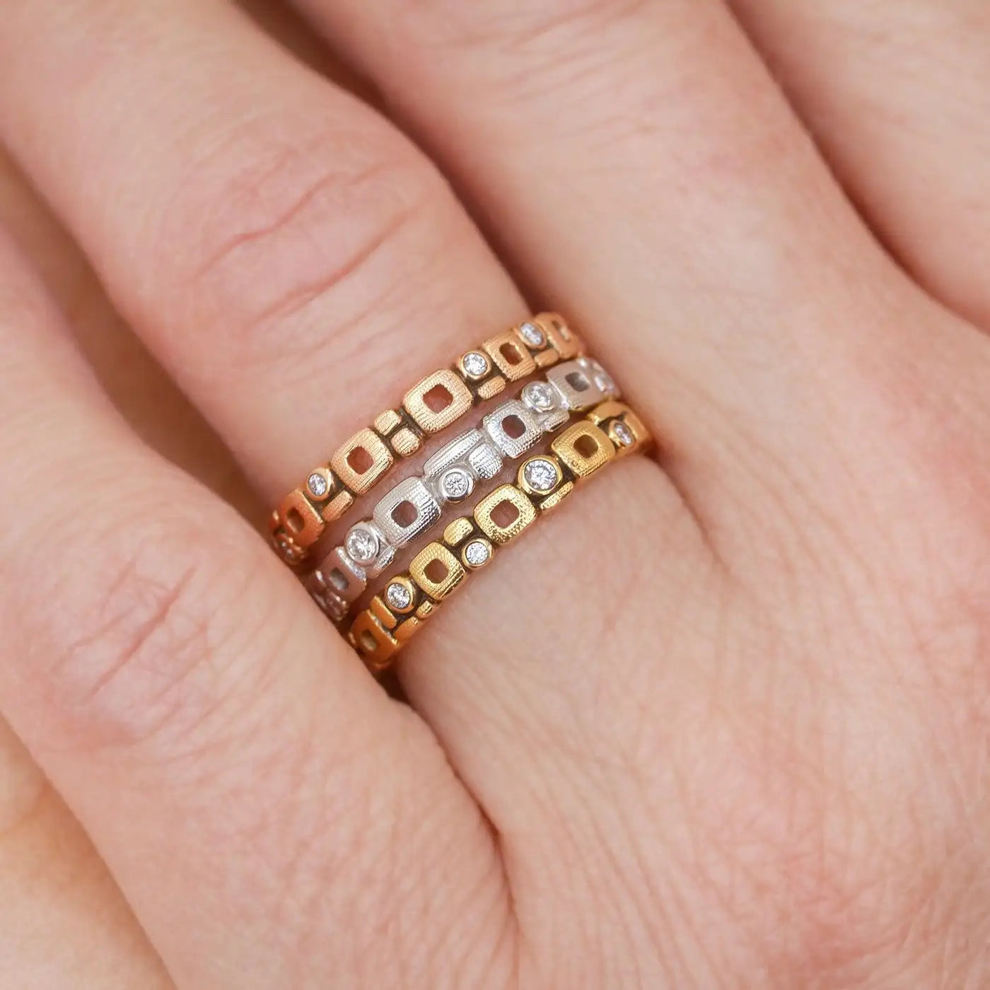stacked rings on model hand
