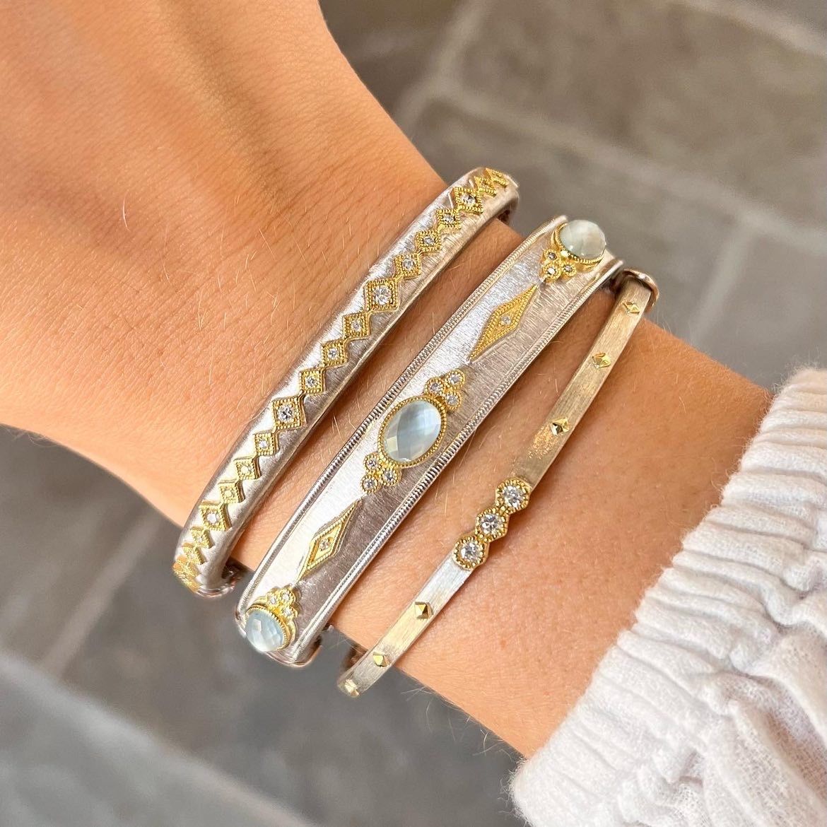 bracelets on woman arm