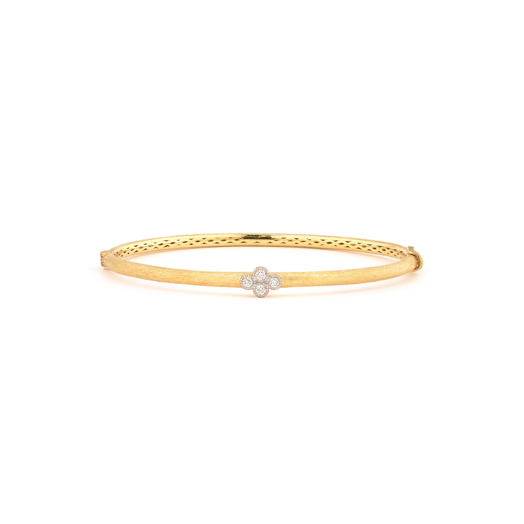 gold band with diamonds in a cross shape