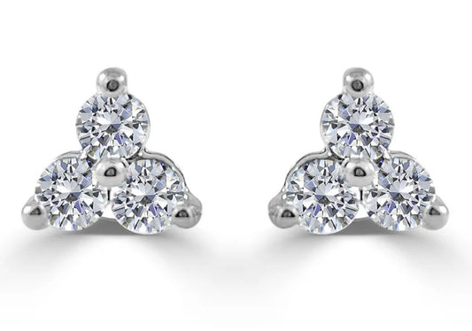 Pair of diamond stud earrings on a white background