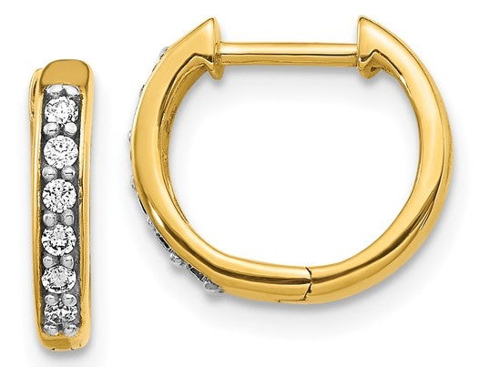 Gold hoop earrings with embedded diamonds on a white background