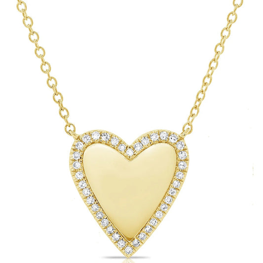 Gold heart-shaped necklace with embedded diamonds on a white background