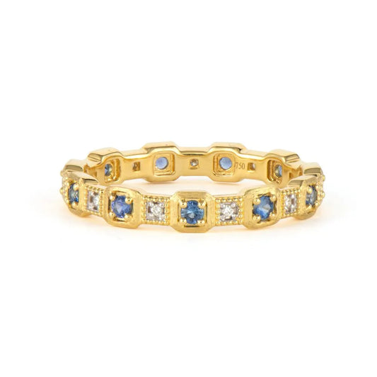 gold band with sapphires and diamonds around