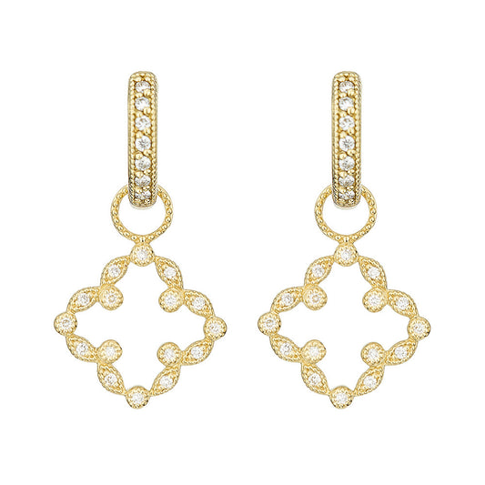 gold earrings with diamond in a clover shape