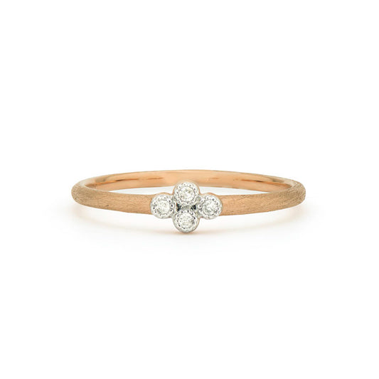 rose gold band with diamonds in the center in a kite shape